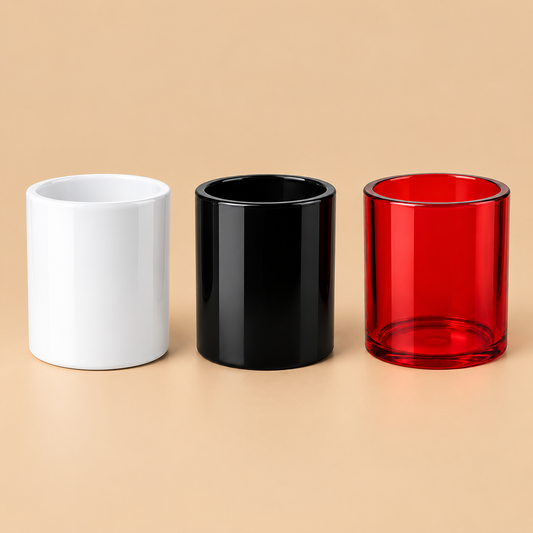 Three Revolt Storage Tumblers in white, black and red side by side
