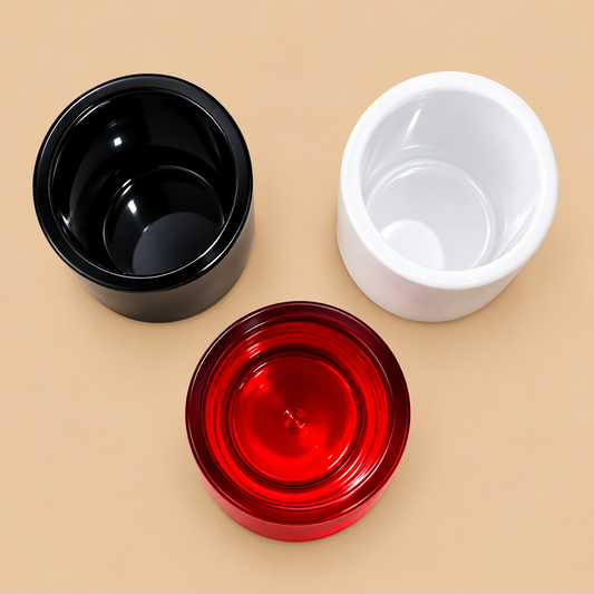 Top-down view of three empty Storage Tumblers ready to be filled with Lubricating Liquid